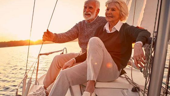 an older couple on a boat after creating a secure retirement